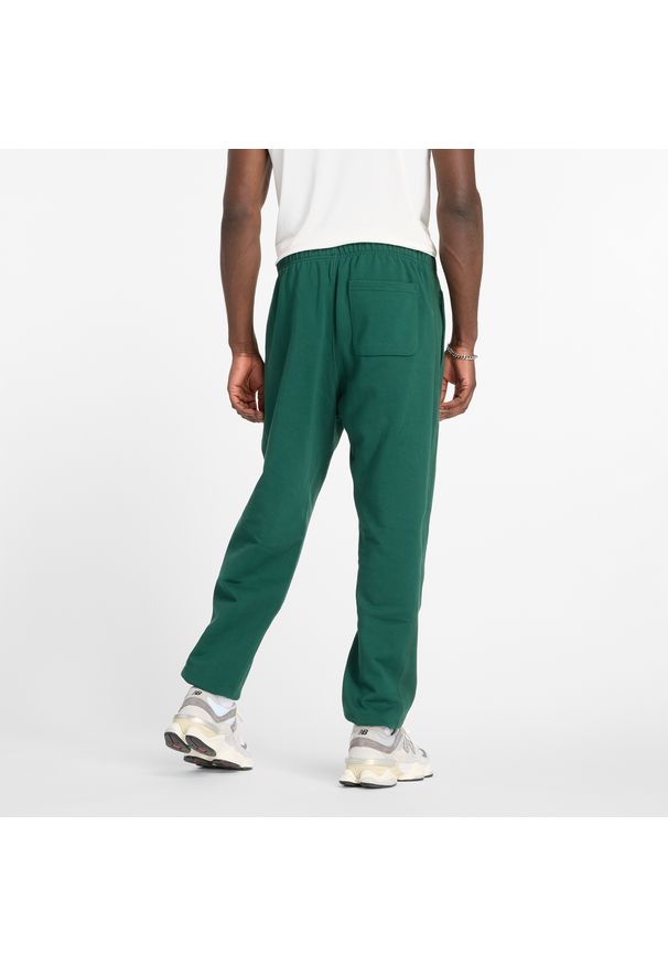 Spodnie męskie New Balance MP41508NWG – zielone. Kolor: zielony. Materiał: tkanina, bawełna, dresówka