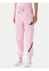 Adidas - adidas Spodnie dresowe Z.N.E. JC5405 Różowy Regular Fit. Kolor: różowy. Materiał: bawełna