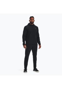 Spodnie dresowe męskie Under Armour STORM RUN PANT. Kolor: czarny. Materiał: dresówka. Sport: bieganie