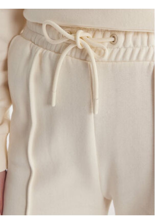 Guess Spodnie dresowe V6RB17 K9V31 Écru Regular Fit. Materiał: bawełna