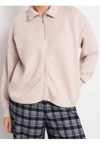 Sinsay - Rozpinana bluza ze stójką - beżowy. Typ kołnierza: kołnierzyk stójkowy. Kolor: beżowy. Materiał: wiskoza, dzianina
