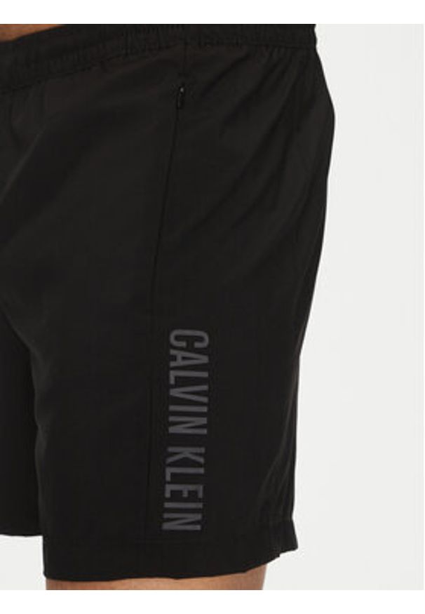 Calvin Klein Swimwear Szorty kąpielowe KM0KM01096 Czarny Regular Fit. Kolor: czarny. Materiał: syntetyk