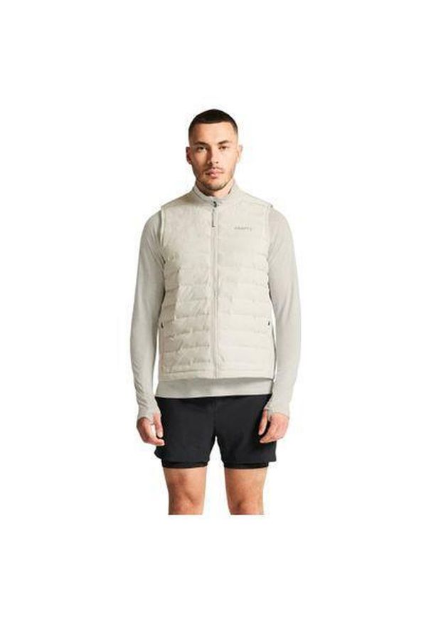 Kurtka puchowa bez rękawów Craft Subz 4. Kolor: szary, niebieski, wielokolorowy. Materiał: puch. Długość rękawa: bez rękawów. Sezon: zima. Sport: turystyka piesza