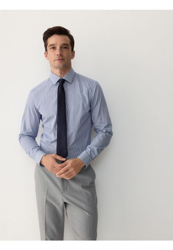 Reserved - Koszula slim z bawełny egipskiej - jasnoniebieski. Kolor: niebieski. Materiał: bawełna