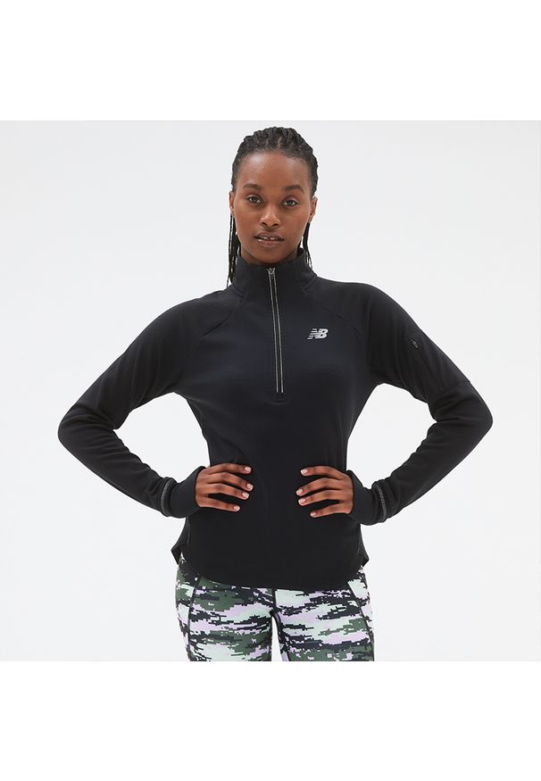 Bluza damska New Balance WT23252BK – czarna. Kolor: czarny. Materiał: tkanina, poliester, materiał, dresówka, skóra. Długość: długie. Sezon: zima. Sport: fitness