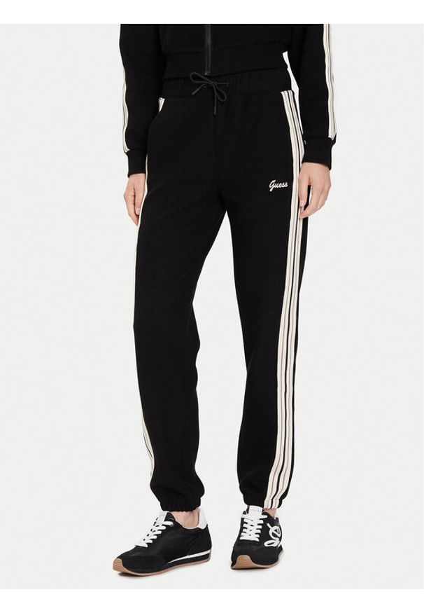 Guess Spodnie dresowe V5BB17 KCX52 Czarny Regular Fit. Kolor: czarny. Materiał: syntetyk