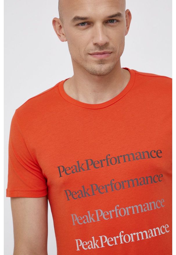 Peak Performance - T-shirt bawełniany. Okazja: na co dzień. Kolor: pomarańczowy. Materiał: bawełna. Wzór: nadruk. Styl: casual