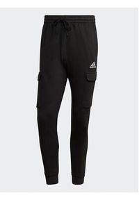 Adidas - adidas Spodnie dresowe Essentials Fleece Regular Tapered Cargo Joggers HL2226 Czarny Regular Fit. Kolor: czarny. Materiał: dresówka, bawełna #4