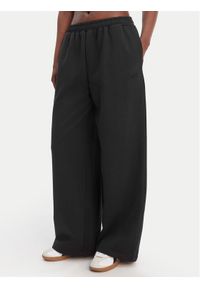 Reebok Spodnie dresowe Reebok x Ewa Chodakowska Hanna RK25624CCW Czarny Wide Leg. Kolor: czarny. Materiał: bawełna #1