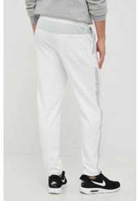 Nike Sportswear Spodnie męskie kolor biały gładkie. Kolor: biały. Materiał: włókno, materiał. Wzór: gładki #2