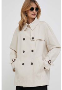 TOMMY HILFIGER - Tommy Hilfiger płaszcz damski kolor beżowy przejściowy dwurzędowy. Kolor: beżowy. Materiał: bawełna. Długość rękawa: raglanowy rękaw
