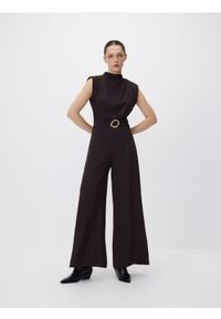 Reserved - Kombinezon z ozdobnym paskiem - ciemnobrązowy. Kolor: brązowy. Materiał: tkanina. Typ sukienki: proste #1