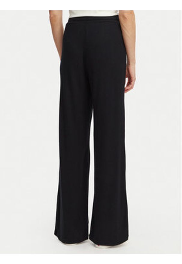 Roxy Spodnie dresowe Rise & Vibe New Rib ERJNP03673 Czarny Relaxed Fit. Kolor: czarny. Materiał: wiskoza