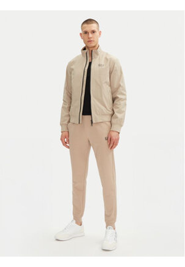 EA7 Emporio Armani Spodnie dresowe 8NPP66 PJVRZ U6155 Beżowy Slim Fit. Kolor: beżowy. Materiał: bawełna