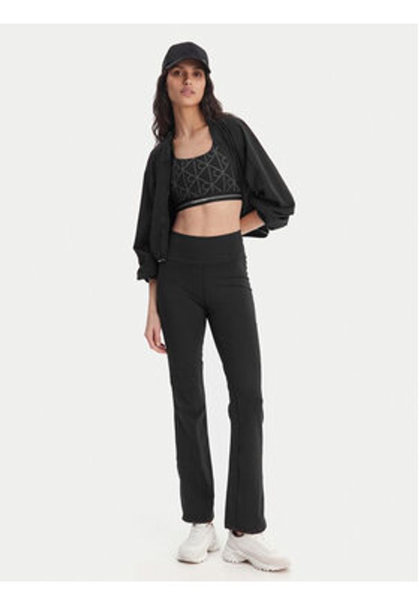 Calvin Klein Performance Legginsy Icon LVGWS6L648 Czarny Flare Fit. Kolor: czarny. Materiał: syntetyk