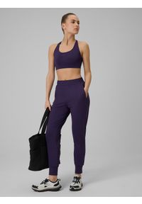 4f - 4F Spodnie treningowe szybkoschnące damskie - fioletowe L. Kolor: fioletowy. Materiał: włókno. Sport: fitness #1