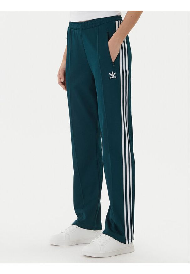 Adidas - adidas Spodnie dresowe Beckenbauer JV7395 Zielony Regular Fit. Kolor: zielony. Materiał: bawełna
