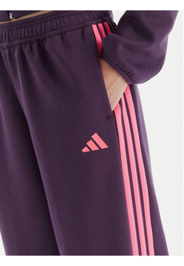 Adidas - adidas Spodnie dresowe Tiro 3-Stripes JM9072 Fioletowy Loose Fit. Kolor: fioletowy. Materiał: bawełna