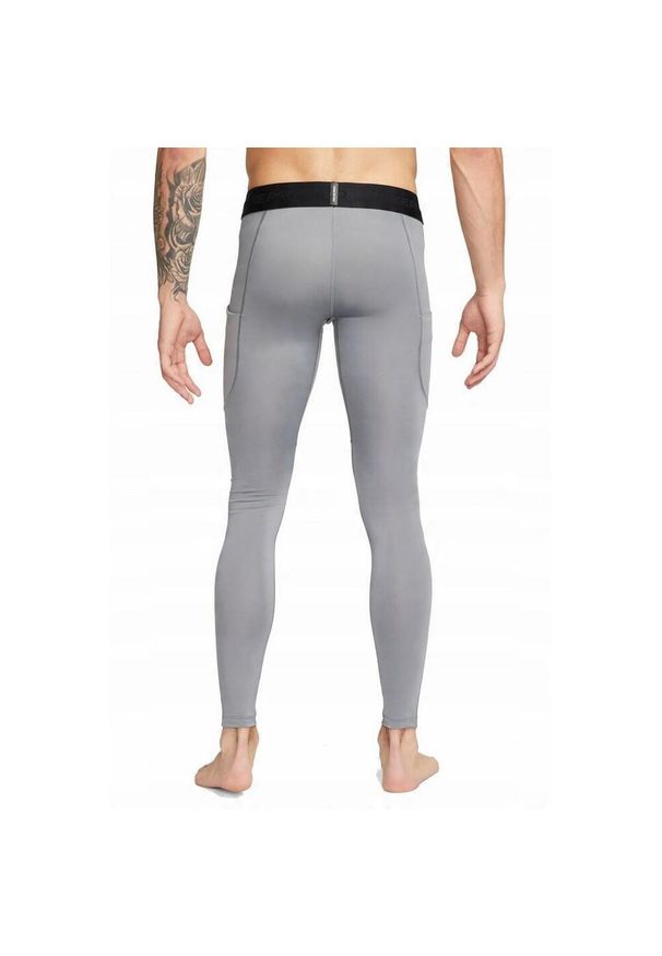 Nike - Męskie Spodnie Termiczne Pro. Kolor: szary. Długość: długie