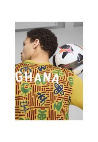 Puma - Męska koszulka przedmeczowa Ghana PUMA Yellow Sizzle Intense Red. Kolor: żółty, czerwony, wielokolorowy