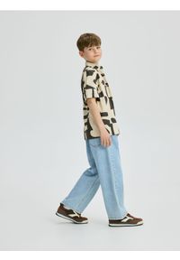 Reserved - Jeansy relaxed fit - niebieski. Kolor: niebieski