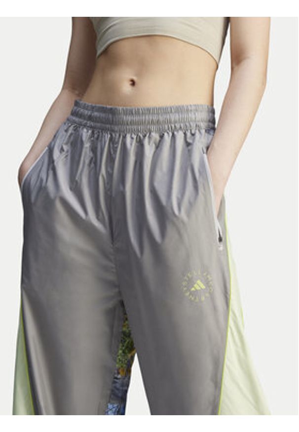 Adidas by Stella McCartney - adidas by Stella McCartney Spodnie dresowe Stella McCartney Earth Collage JG5794 Szary Loose Fit. Kolor: szary. Materiał: syntetyk