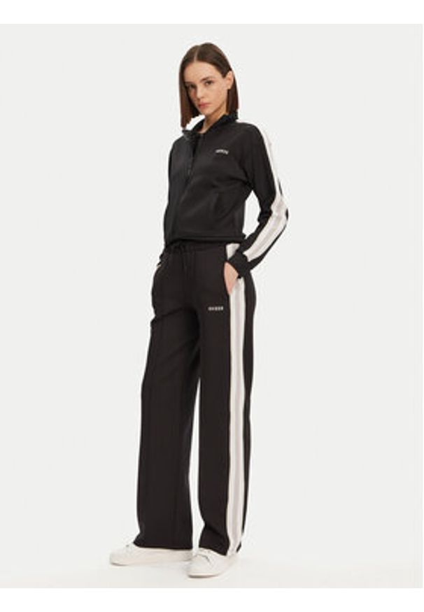 Guess Spodnie dresowe V5GB12 KCRU2 Czarny Regular Fit. Kolor: czarny. Materiał: syntetyk
