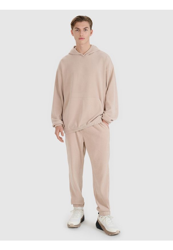 4f - 4F Spodnie dresowe joggery męskie - beżowe M. Kolor: beżowy. Materiał: dresówka