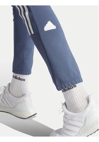 Adidas - adidas Spodnie dresowe Future Icons 3-Stripes IR9194 Niebieski Slim Fit. Kolor: niebieski. Materiał: bawełna #5