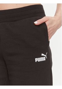 Puma Spodnie dresowe Ess+ 676093 Czarny Regular Fit. Kolor: czarny. Materiał: bawełna