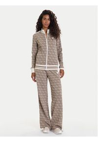 Guess Spodnie dresowe V5BB15 K1990 Brązowy Relaxed Fit. Kolor: brązowy. Materiał: syntetyk #5