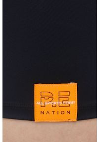 P.E Nation szorty treningowe Backswing damskie kolor czarny z nadrukiem high waist. Stan: podwyższony. Kolor: czarny. Materiał: skóra, dzianina, poliamid. Wzór: nadruk #3