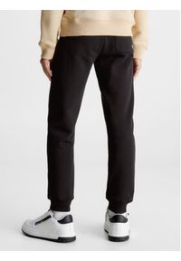 Calvin Klein Jeans Spodnie dresowe Logo IU0IU00604 Czarny Regular Fit. Kolor: czarny. Materiał: bawełna #3
