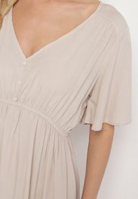 Born2be - Beżowa Bawełniana Sukienka o Rozkloszowanym Fasonie Liranelle. Okazja: na co dzień. Typ kołnierza: dekolt w kształcie V. Kolor: beżowy. Materiał: bawełna. Długość rękawa: krótki rękaw. Sezon: lato. Typ sukienki: rozkloszowane. Styl: elegancki, casual #5