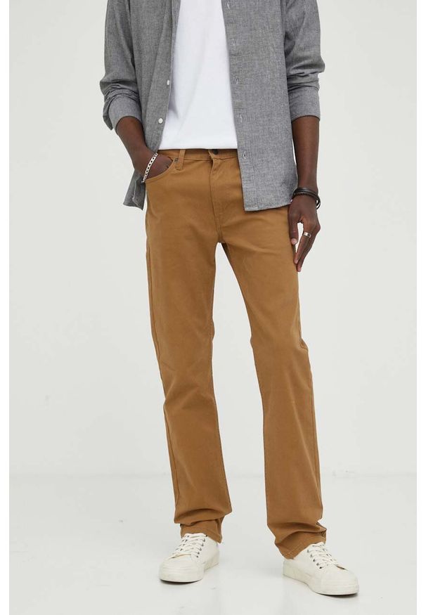 Levi's® - Levi's jeansy 513 SLIM STRAIGHT męskie kolor brązowy. Okazja: na spotkanie biznesowe. Kolor: brązowy. Styl: biznesowy
