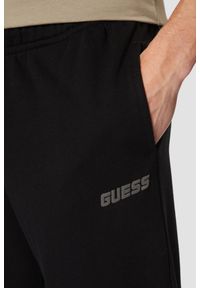 Guess - GUESS Czarne męskie spodnie dresowe Emis. Kolor: czarny. Materiał: dresówka #5