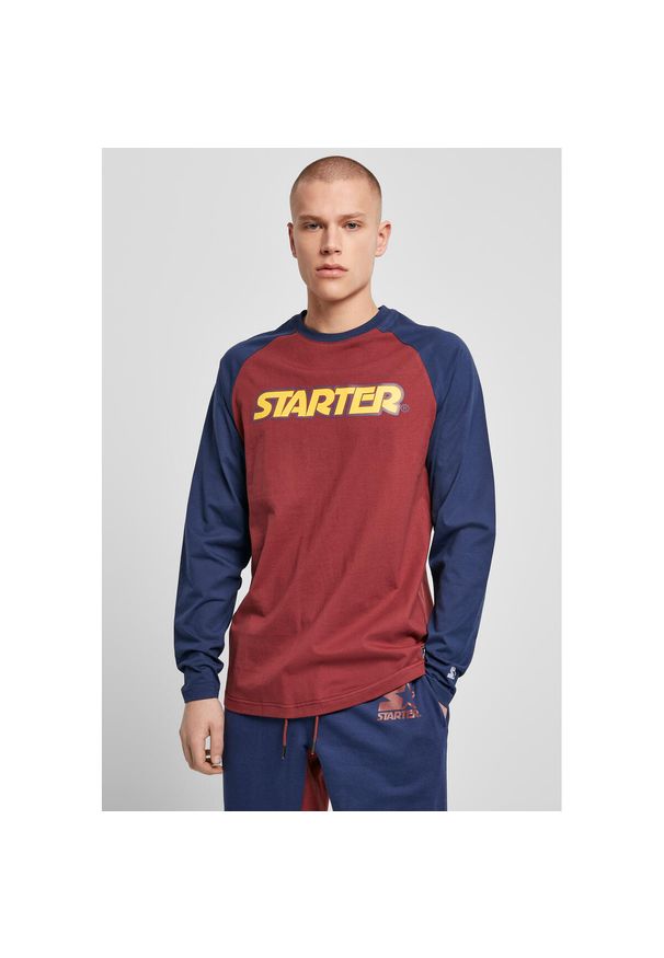 Koszulka z długim rękawem Urban Classics starter raglan. Kolor: niebieski, czerwony, wielokolorowy. Długość rękawa: długi rękaw. Długość: długie. Styl: sportowy