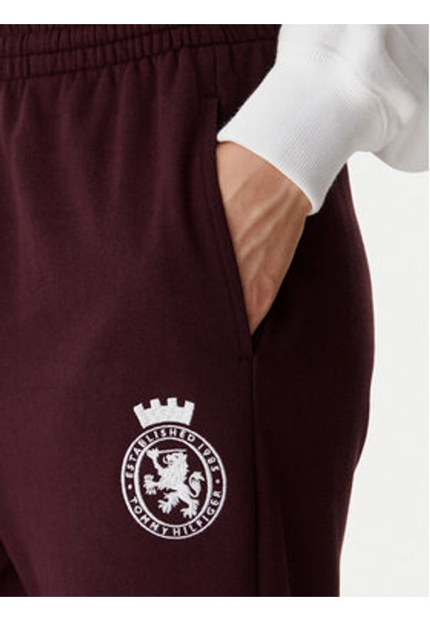 TOMMY HILFIGER - Tommy Hilfiger Spodnie dresowe UW0UW06081 Bordowy Wide Leg. Kolor: czerwony. Materiał: bawełna