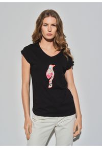 Ochnik - Czarny T-shirt damski z kwiatowym logo. Kolor: czarny. Materiał: materiał. Wzór: kwiaty