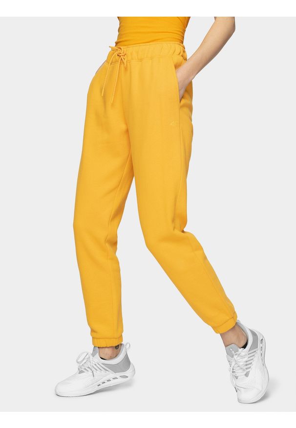4f - Spodnie dresowe damskie. Kolor: żółty. Materiał: dresówka