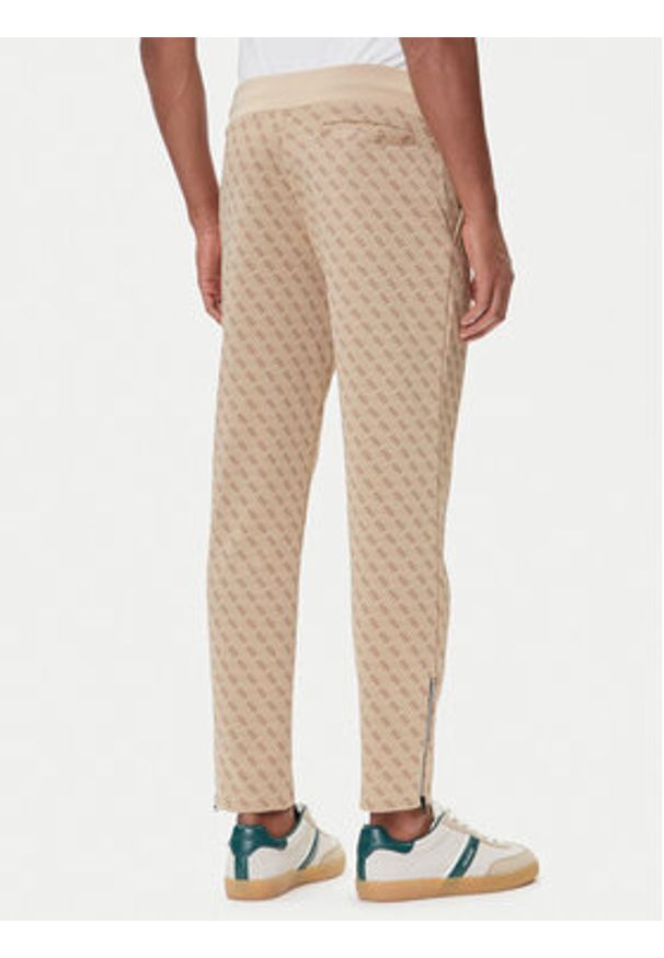 Guess Spodnie dresowe Z2BB05 K7122 Beżowy Regular Fit. Kolor: beżowy. Materiał: syntetyk, bawełna