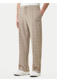 Guess Spodnie dresowe Z6GB03 K2850 Beżowy Regular Fit. Kolor: beżowy. Materiał: syntetyk #1