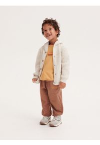 Reserved - Melanżowe spodnie jogger - brązowy. Kolor: brązowy. Materiał: dzianina. Wzór: melanż #1
