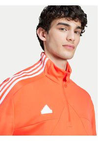 Adidas - adidas Bluza House of Tiro IW3578 Pomarańczowy Loose Fit. Kolor: pomarańczowy. Materiał: bawełna