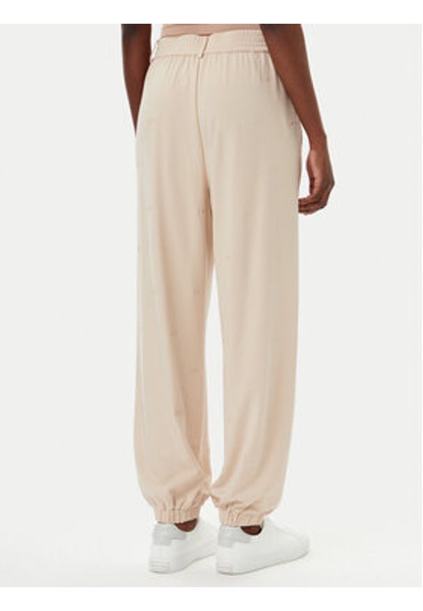 Liu Jo Sport Spodnie dresowe TA5193 J5942 Beżowy Relaxed Fit. Kolor: beżowy. Materiał: bawełna