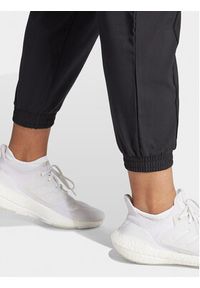 Adidas - adidas Spodnie dresowe Train Essentials Minimal IJ5923 Czarny Regular Fit. Kolor: czarny. Materiał: syntetyk #11