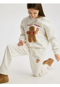 Reserved - Spodnie dresowe ze świątecznym haftem - złamana biel. Materiał: dresówka. Wzór: haft. Styl: wizytowy #1