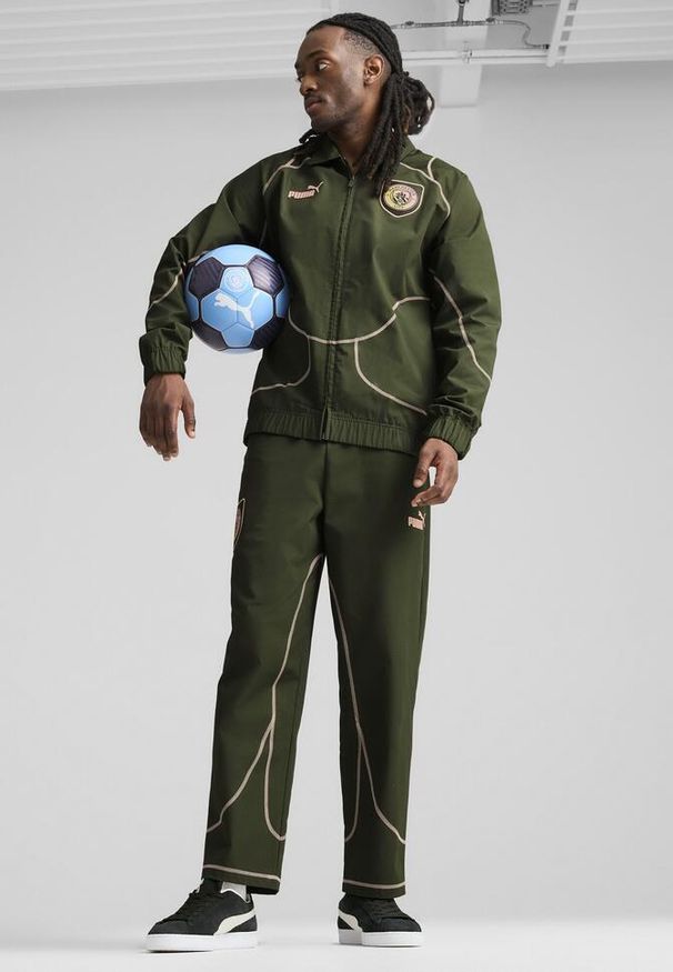 Puma - Męskie spodnie dresowe ftblSTATEMENT Manchester City PUMA. Kolor: różowy. Materiał: dresówka