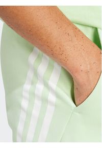 Adidas - adidas Szorty sportowe Future Icons 3-Stripes IR9200 Zielony Regular Fit. Kolor: zielony. Materiał: bawełna, syntetyk. Styl: sportowy