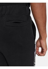 Plein Sport Spodnie dresowe SADC MJT2226 SJO001N Czarny Regular Fit. Kolor: czarny. Materiał: bawełna